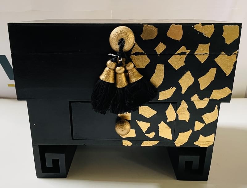 BLACK AND GOLD DECORATIVE WOODEN CHEST WITH DRAWER