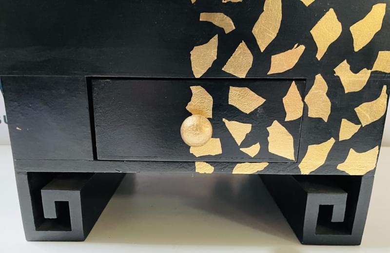 BLACK AND GOLD DECORATIVE WOODEN CHEST WITH DRAWER