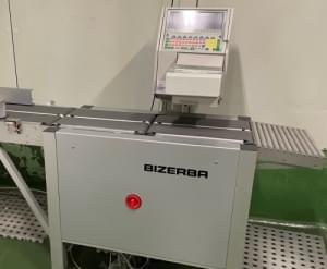 Subasta 4 lotes de maquinaria de envasado industrial Bizerba en León